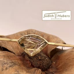 Handgemaakte geelgouden armband met cabouchon geslepen Rutielkwarts