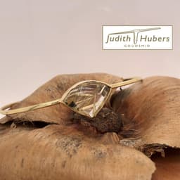 Handgemaakte geelgouden armband met cabouchon geslepen Rutielkwarts