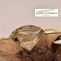 Handgemaakte geelgouden armband met cabouchon geslepen Rutielkwarts